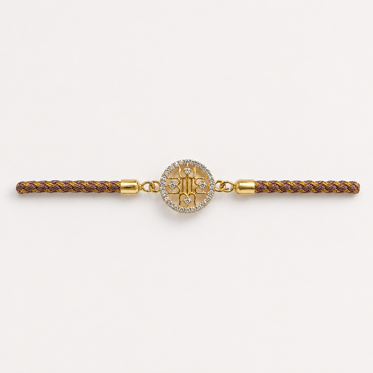 Elegant gold-accented rakhi on warm white Elegant Gold-Accented Rakhi - Image 1